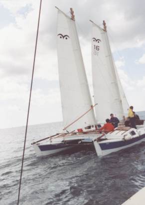 Tiki 31 with schooner rig passing Tiki 28