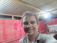 Rogerio Martin with sawdust on his face