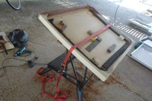 Hatch clamped to a workbench