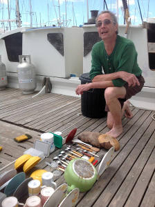 Paul next to his washing up on deck of Gaia