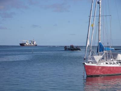Supply freighter, barge and monohull yacht