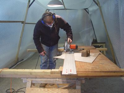 John using a plunge saw in the workshop