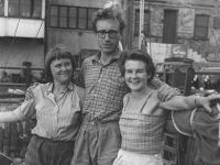 Old photo of Jutta, James and Ruth in a harbour