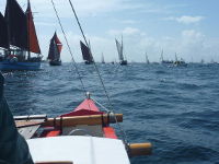 Amatasi sailing alongside other boats