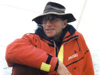 James Wharram in red raincoat