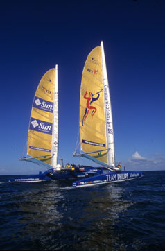 Racing catamaran, twin sails