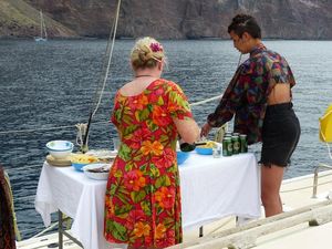 Food and drink for the wedding being prepared on deck