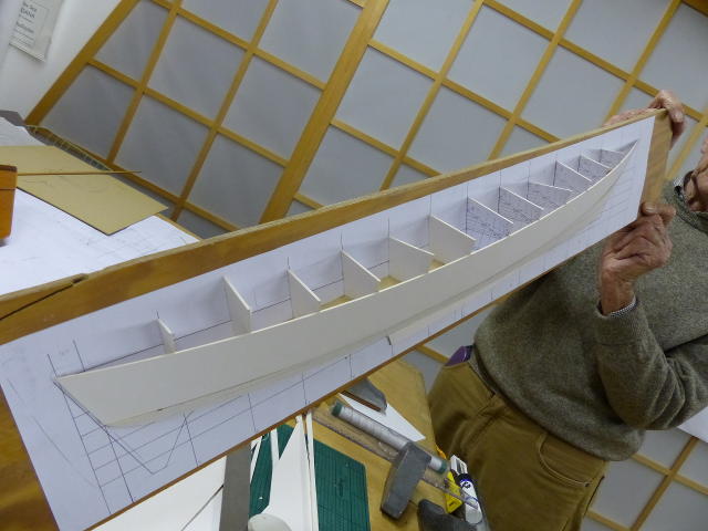 Half model of Mana hull, next to lines drawing
