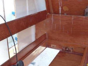 Injecting wood panels with termite killer