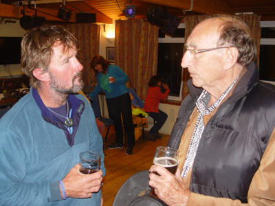 Rory and James in discussion over a drink