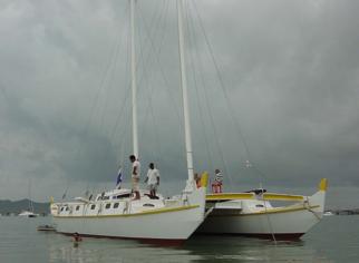 Large white and yellow catamaran